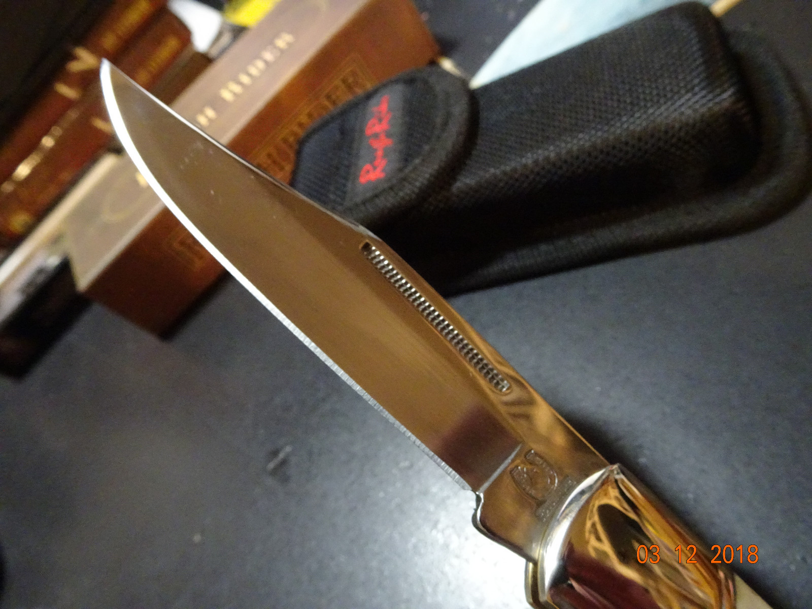 5″ LOCKBACK ROUGH RIDER MODEL RR-067 440A S.S. AND A SMOOTH WHITE BONE HANDLE