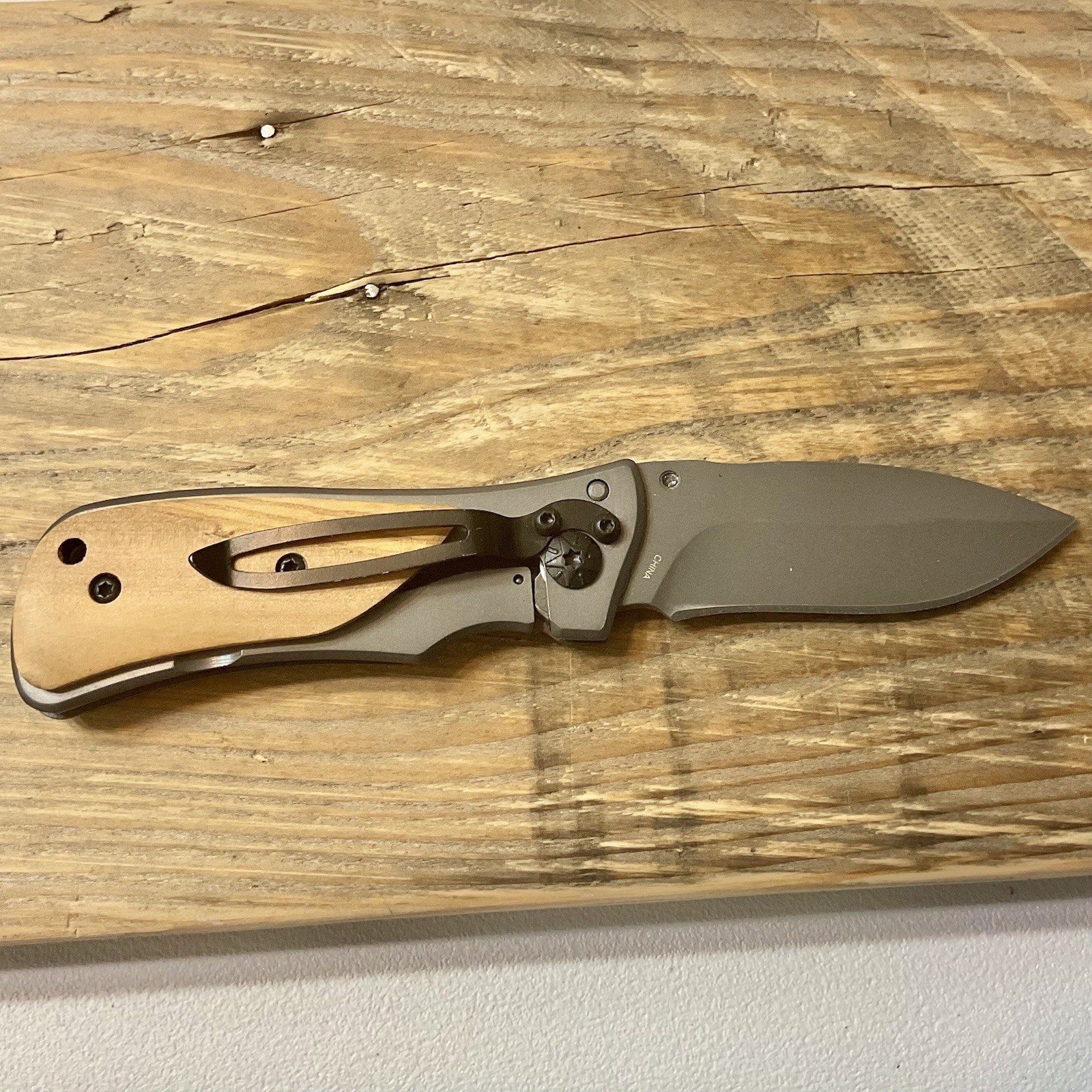 NRA Stone River Frame Lock Folding Knife with Pocket Clip Two Tone Wood Handle