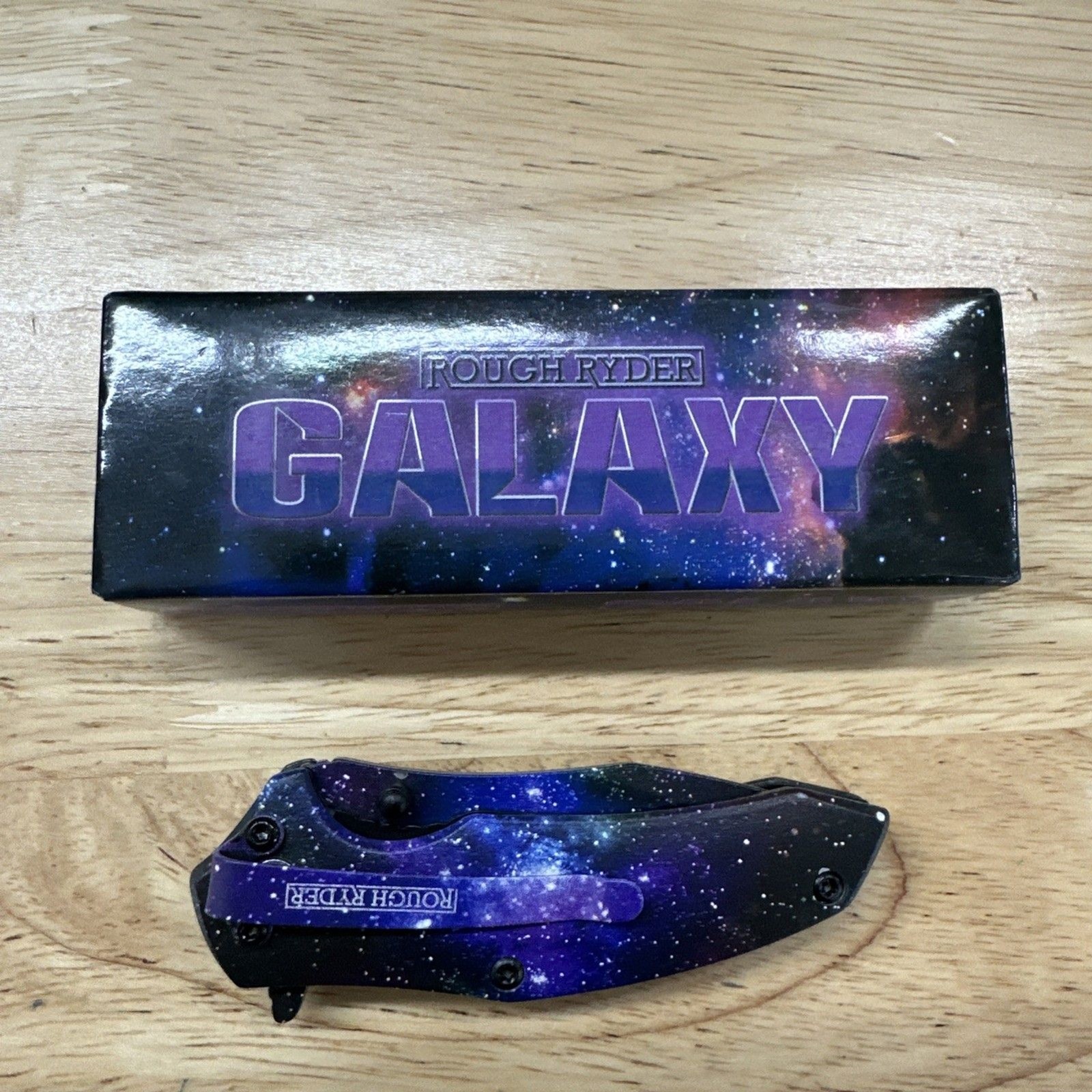 Rough Rider Galaxy Space Linerlock RR2129 2.25″ Stainless Synthetic Folding