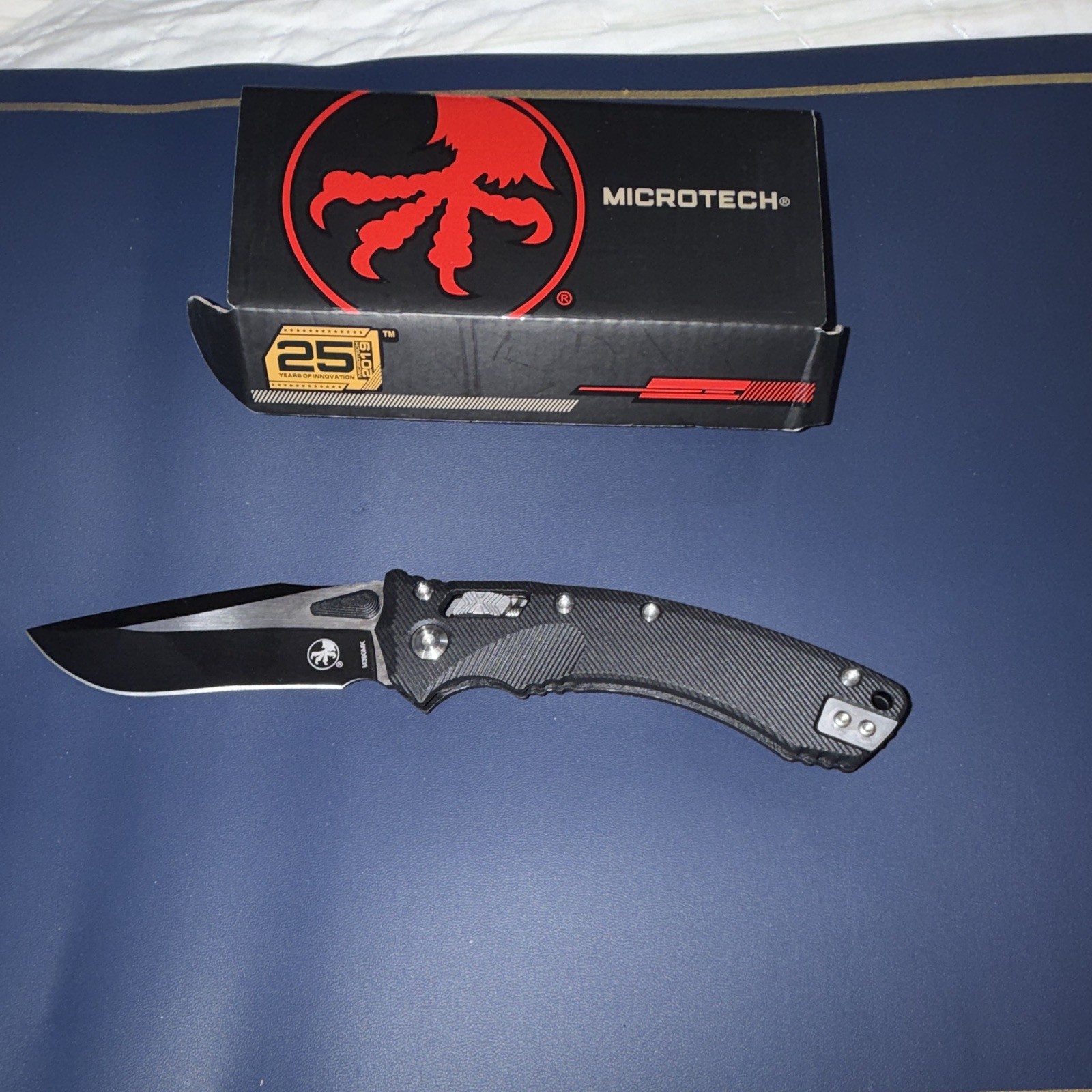 Microtech M390MK Pocketknife Black Aluminum Handle Liner Lock Drop Point Plain